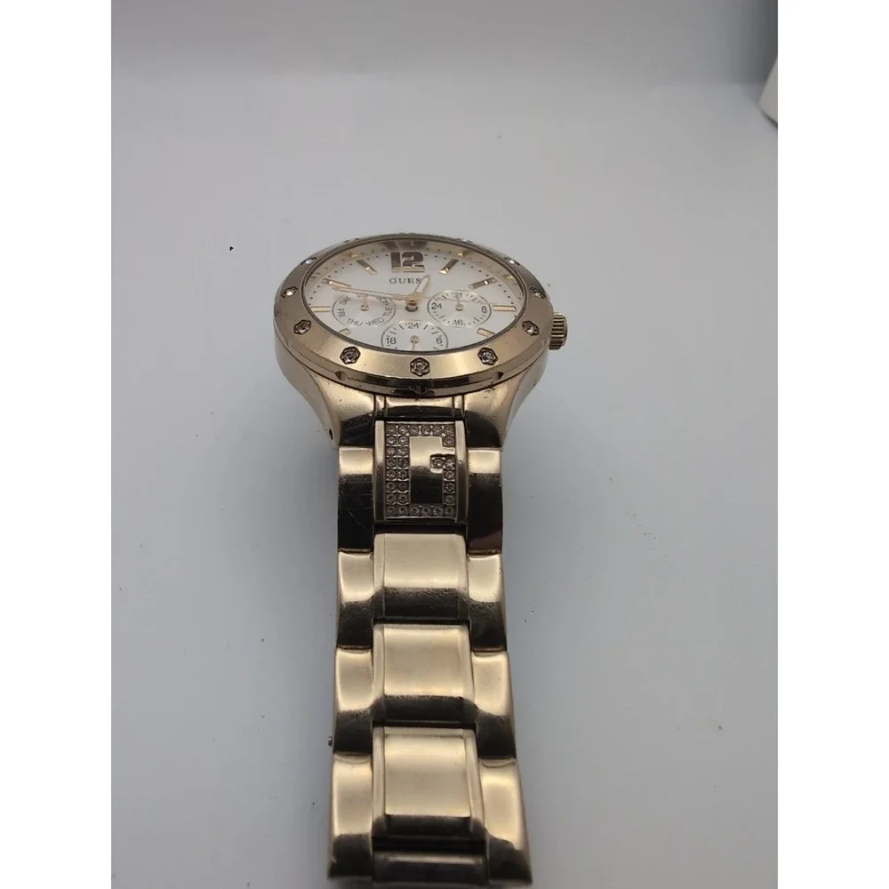 GUESS Women's U15078L1 Quartz Analog Chrono Dress Watch. Good Tone w Crystal 
